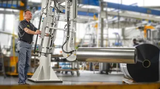 Handling manipulator for lifting film rolls